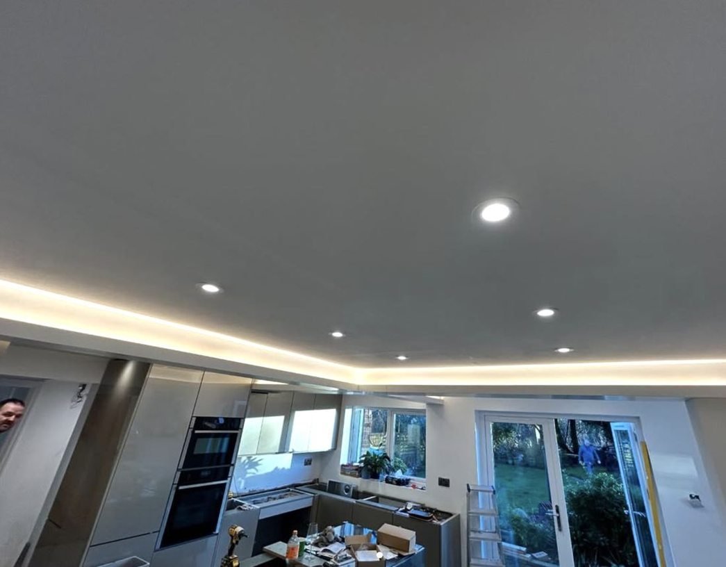 Kitchen with downlights and LED strip