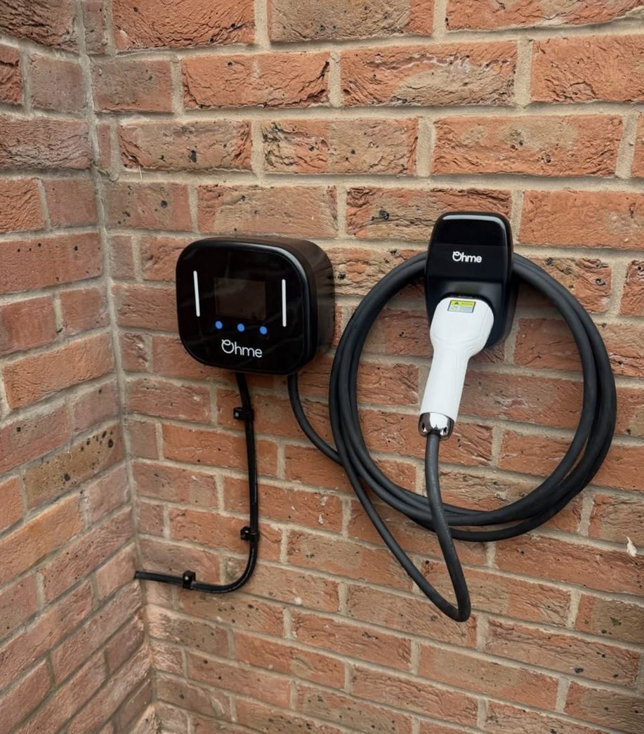 EV charger on a brick wall